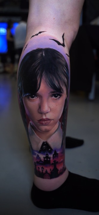 Colour portrait of Wednesday Addams with bats and a gothic house in purple light, on a calf.